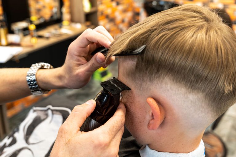 Kids bald fade at cuts and lather barbershop