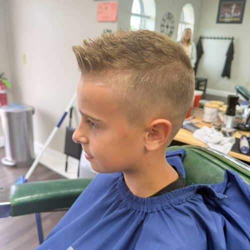 Child haircut at cuts and lather barbershop in Clarence